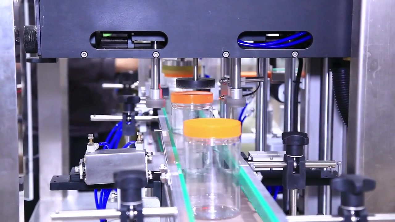 Automatic four-wheel servo capping machine running test